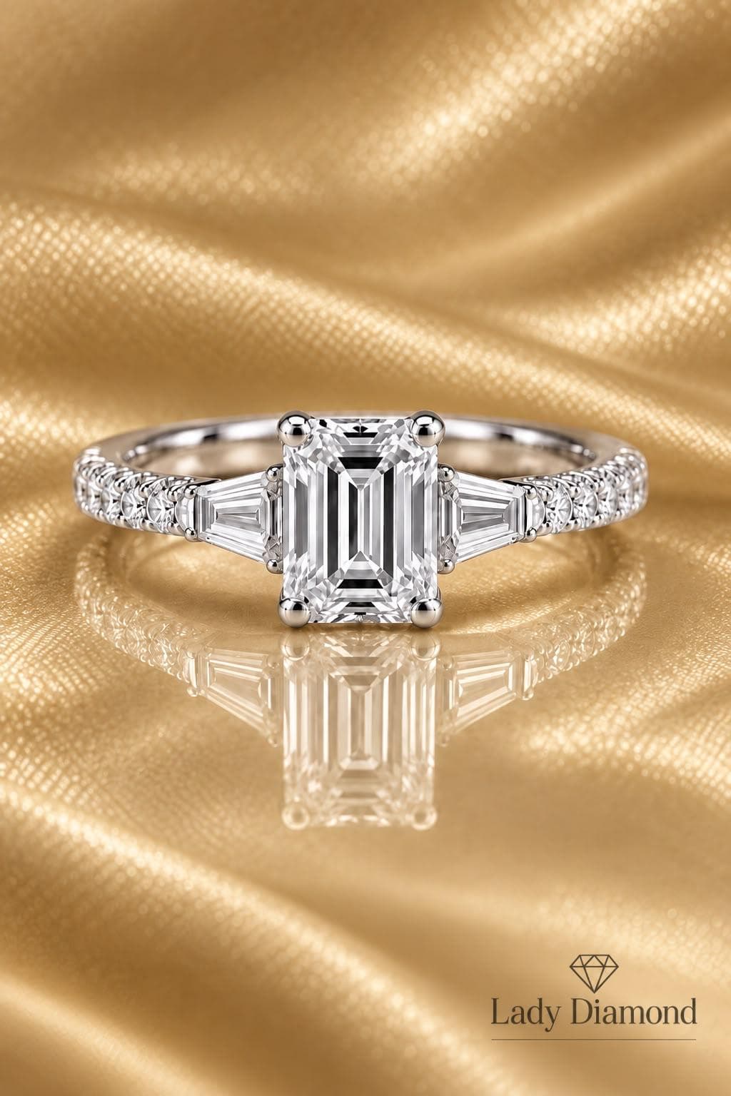 Three-Stone Emerald-Cut Diamond Ring with Tapered Baguettes — White Gold