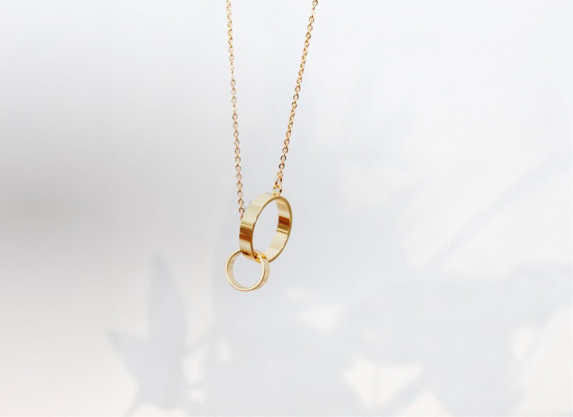 Close-up of a Lady Diamond gold necklace